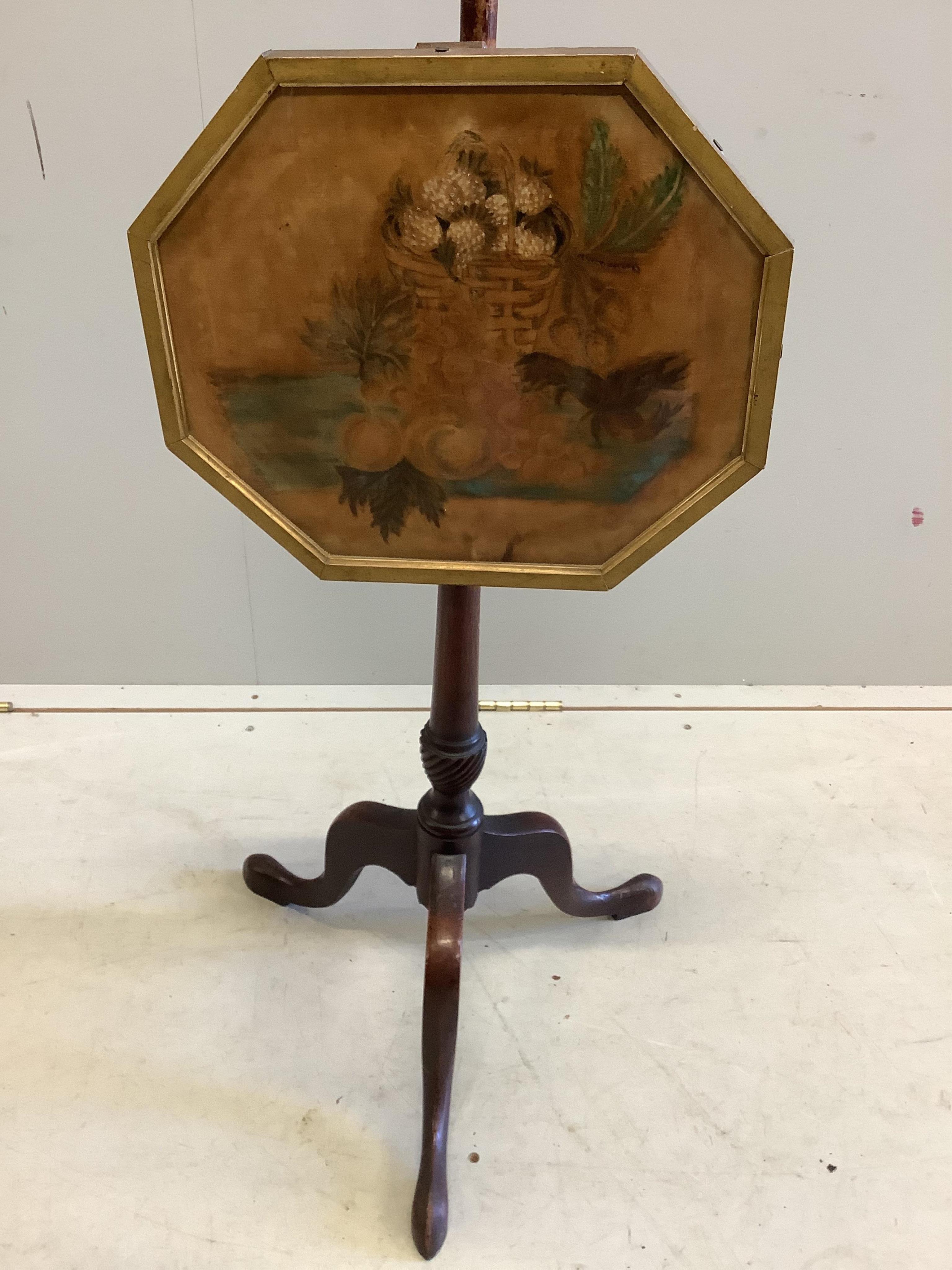 A George III mahogany pole screen with octagonal painted banner, width 46cm, depth 46cm, height 161cm